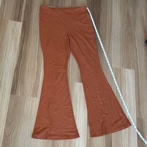 No Boundaries Flared Leggings in Rust